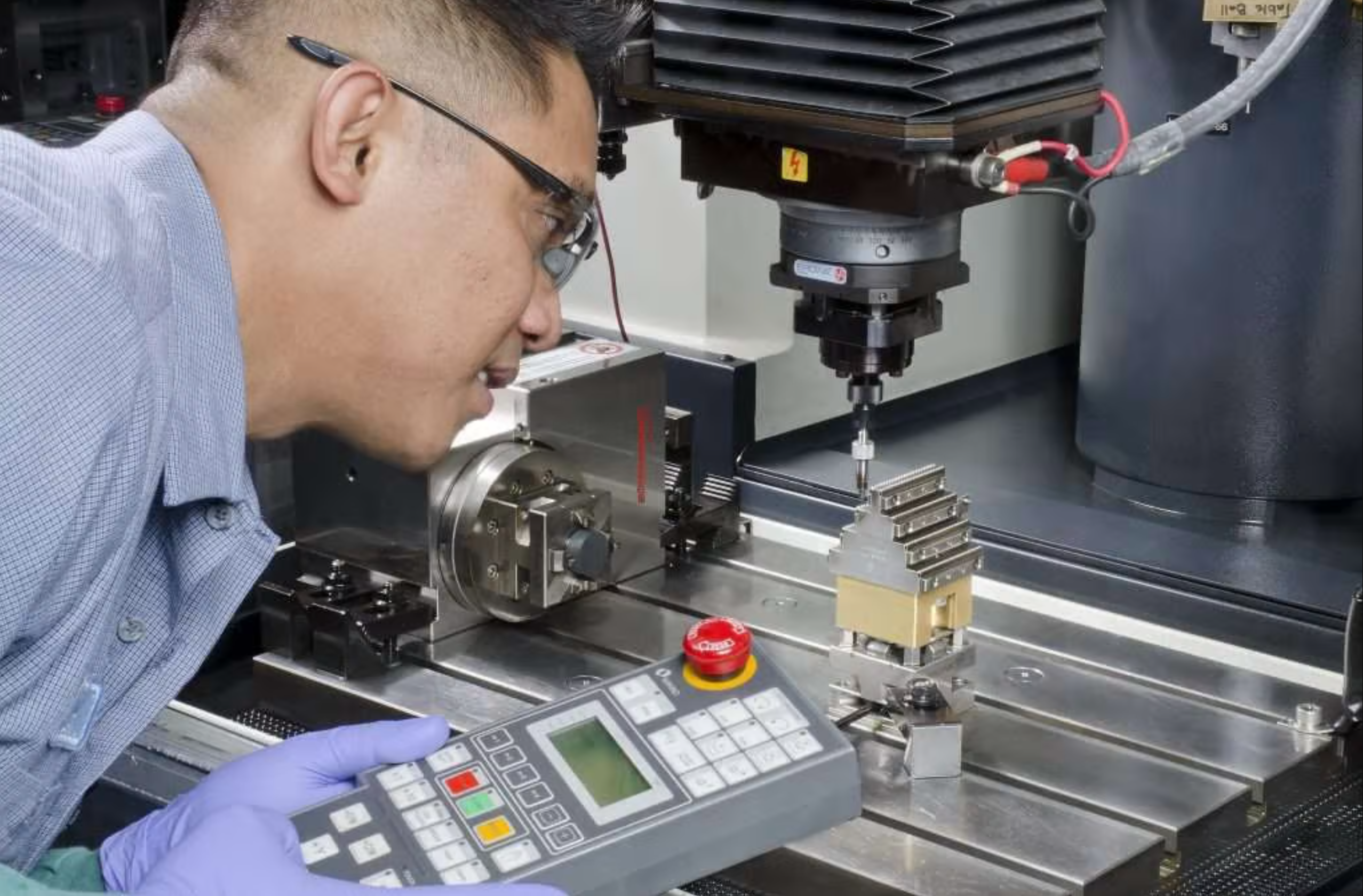 Skilled worker fabricating metal in a shop